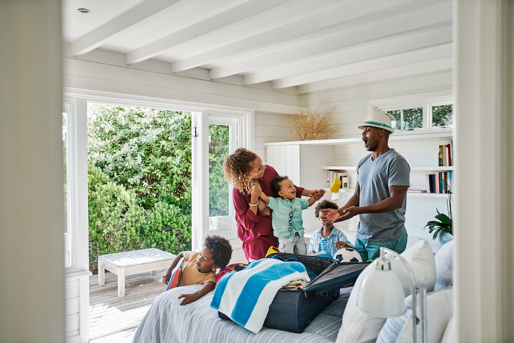 Happy family getting ready to go on vacation