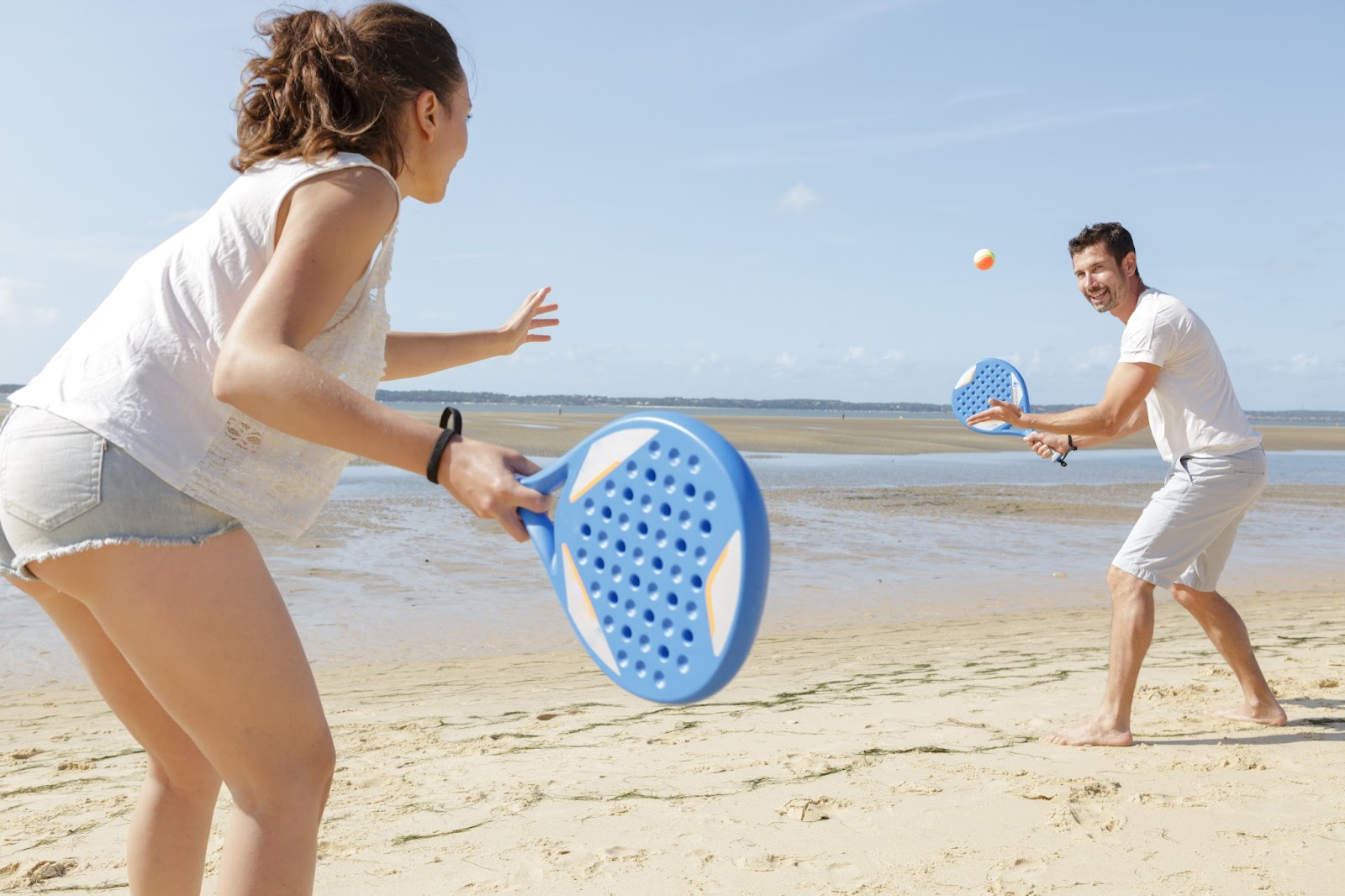 people playing beach tennis